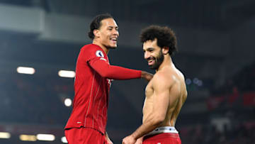 LIVERPOOL, ENGLAND - JANUARY 19: Virgil van Dijk and Mohamed Salah of Liverpool celebrate victory after the Premier League match between Liverpool FC and Manchester United at Anfield on January 19, 2020 in Liverpool, United Kingdom. (Photo by Michael Regan/Getty Images)