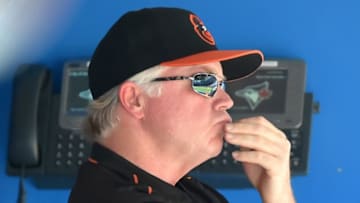 Jul 30, 2016; Toronto, Ontario, CAN; Baltimore Orioles manager Buck Showalter (28) stands by the dugout phones as he watches play against the Toronto Blue Jays during the fifth inning at Rogers Centre. Mandatory Credit: Dan Hamilton-USA TODAY Sports