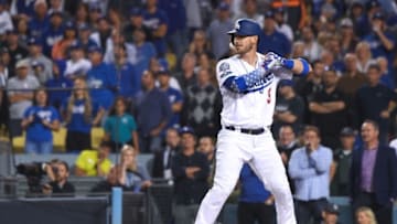 LOS ANGELES, CA - OCTOBER 16: Yasmani Grandal #9 of the Los Angeles Dodgers at bat in the eleventh inning against the Milwaukee Brewers in Game Four of the National League Championship Series at Dodger Stadium on October 16, 2018 in Los Angeles, California. (Photo by Harry How/Getty Images)
