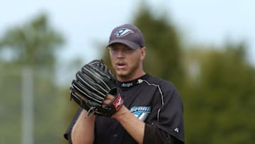 Toronto Blue Jays pitcher Roy Halladay delivers a pitch during practice March 3, 2004 in Dunedin, Florida. (Photo by A. Messerschmidt/Getty Images)