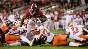 SANTA CLARA, CA - JANUARY 07: Josh Jacobs #8 of the Alabama Crimson Tide carries the ball against the Clemson Tigersin the CFP National Championship presented by AT&T at Levi's Stadium on January 7, 2019 in Santa Clara, California. (Photo by Harry How/Getty Images)
