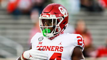 LUBBOCK, TEXAS - OCTOBER 31: Running back Marcus Major #24 of the Oklahoma Sooners gestures before the college football game against the Texas Tech Red Raiders at Jones AT&T Stadium on October 31, 2020 in Lubbock, Texas. (Photo by John E. Moore III/Getty Images)