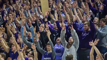 MANHATTAN, KS - FEBRUARY 05: K-State student section signal a three point shot as a player successfully completes one during the Big 12 regular season game between the Kansas Jayhawks and Kansas State Wildcats, on Tuesday, February 5th, 2019 at Bramlage Coliseum in Manhattan, Kansas. (Photo by Nick Tre. Smith/Icon Sportswire via Getty Images)