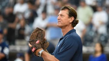 SAN DIEGO, CA - AUGUST 16: Former San Diego Padres pitcher Trevor Hoffman catches the ceremonial first pitch before a baseball game between the San Diego Padress and the Arizona Diamondbacks at PETCO Park on August 16, 2018 in San Diego, California. (Photo by Denis Poroy/Getty Images)