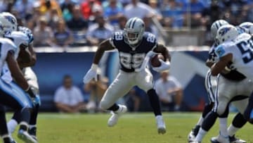 Sep 14, 2014; Nashville, TN, USA; Dallas Cowboys running back DeMarco Murray (29) rushes against the Tennessee Titans during the first half at LP Field. Mandatory Credit: Jim Brown-USA TODAY Sports