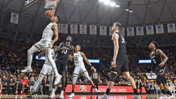 WICHITA, KS - FEBRUARY 06: Jaime Echenique #21 of the Wichita State Shockers drives in for a dunk during the first half against the Cincinnati Bearcats at Charles Koch Arena on February 6, 2020 in Wichita, Kansas. (Photo by Peter G. Aiken/Getty Images)