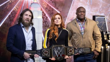 NEW YORK, NEW YORK - APRIL 05: WWE Superstars Daniel Bryan, Becky Lynch and Bobby Lashley Celebrate Wrestlemania 35 at The Empire State Building on April 05, 2019 in New York City. (Photo by Santiago Felipe/Getty Images)