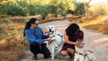 Photo: Couple Ryan and Patsy along with dogs Portland and Genseng.. Image Courtesy Guiding Eyes for the Blind