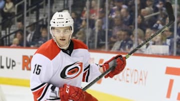 Feb 5, 2016; Winnipeg, Manitoba, CAN; Carolina Hurricanes right wing Andrej Nestrasil (15) celebrates his goal on Winnipeg Jets goalie Michael Hutchinson (34) during the third period at MTS Centre. Carolina won 5-3. Mandatory Credit: Bruce Fedyck-USA TODAY Sports