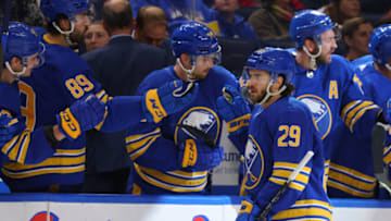 Oct 4, 2022; Buffalo, New York, USA; Buffalo Sabres center Vinnie Hinostroza (29) celebrates his goal with teammates during the first period against the Carolina Hurricanes at KeyBank Center. Mandatory Credit: Timothy T. Ludwig-USA TODAY Sports
