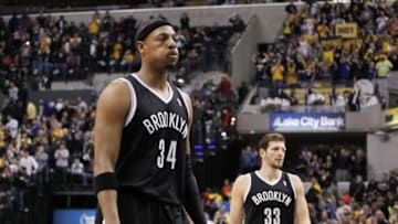 Dec 28, 2013; Indianapolis, IN, USA; Brooklyn Nets forward Paul Pierce (14) walks off the floor dejected after losing to the Indiana Pacers at Bankers Life Fieldhouse. Indiana defeats Brooklyn 105-91. Mandatory Credit: Brian Spurlock-USA TODAY Sports