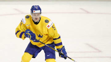 VICTORIA , BC - DECEMBER 29: Adam Ginning #5 of Sweden versus the United States at the IIHF World Junior Championships at the Save-on-Foods Memorial Centre on December 29, 2018 in Victoria, British Columbia, Canada. (Photo by Kevin Light/Getty Images)