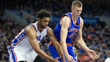 Dec 18, 2015; Philadelphia, PA, USA; Philadelphia 76ers center Jahlil Okafor (8) and New York Knicks forward Kristaps Porzingis (6) compete for a loose ball during the second quarter at Wells Fargo Center. Mandatory Credit: Bill Streicher-USA TODAY Sports