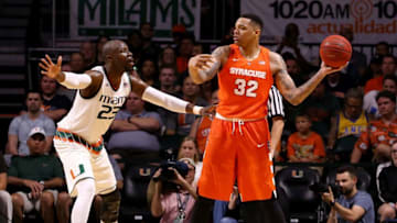 Jan 2, 2016; Coral Gables, FL, USA; Syracuse Orange center DaJuan Coleman (32) is pressured by Miami Hurricanes center Tonye Jekiri (23) during the second half at BankUnited Center. Miami won 64-51. Mandatory Credit: Steve Mitchell-USA TODAY Sports