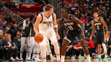 NEW ORLEANS, LA -OCTOBER 25: Luka Doncic #77 of the Dallas Mavericks handles the ball against the New Orleans Pelicans on October 25, 2019 at the Smoothie King Center in New Orleans, Louisiana. NOTE TO USER: User expressly acknowledges and agrees that, by downloading and or using this Photograph, user is consenting to the terms and conditions of the Getty Images License Agreement. Mandatory Copyright Notice: Copyright 2019 NBAE (Photo by Layne Murdoch Jr./NBAE via Getty Images)