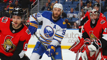 BUFFALO, NY - APRIL 4: Christian Wolanin #86 and Craig Anderson #41 of the Ottawa Senators defend the net against Ryan O'Reilly #90 of the Buffalo Sabres during an NHL game on April 4, 2018 at KeyBank Center in Buffalo, New York. (Photo by Bill Wippert/NHLI via Getty Images)