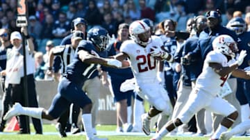 August 27th 2017, Allianz Stadium, Sydney, Australia; College Football Sydney Cup; Rice University v Stanford University; Standford Cardinals running back Bryce Love fends off Rice Owls safety JT Ibe; (Photo by Nigel Owen/Action Plus via Getty Images)