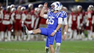 NEW YORK, NY - DECEMBER 26: Ross Martin #35 of the Duke Blue Devils watches his game winning field goal against the Indiana Hoosiers during overtime of the New Era Pinstripe Bowl at Yankee Stadium on December 26, 2015 in the Bronx borough of New York City. Duke defeated Indiana 44-41 in overtime. (Photo by Adam Hunger/Getty Images)