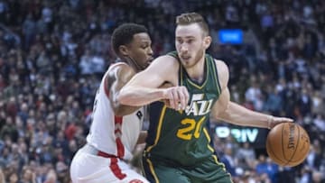 Mar 2, 2016; Toronto, Ontario, CAN; Utah Jazz forward Gordon Hayward (20) moves against Toronto Raptors guard Kyle Lowry (7) in the fourth quarter at Air Canada Centre. Raptors beat Jazz 104 - 94. Mandatory Credit: Peter Llewellyn-USA TODAY Sports