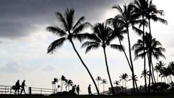 HONOLULU, HI - JANUARY 15: Justin Thomas of the United States, Zach Johnson of the United States and Justin Rose of England walk to the 17th green during the final round of the Sony Open In Hawaii at Waialae Country Club on January 15, 2017 in Honolulu, Hawaii. (Photo by Sean M. Haffey/Getty Images)