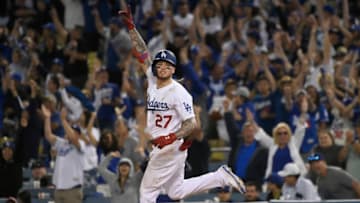 LOS ANGELES, CA - JUNE 22: Alex Verdugo #27 of the Los Angeles Dodgers celebrates running to second base after his 11th inning walk-off home run defeated the Colorado Rockies 5-4 at Dodger Stadium on June 22, 2019 in Los Angeles, California. (Photo by John McCoy/Getty Images)