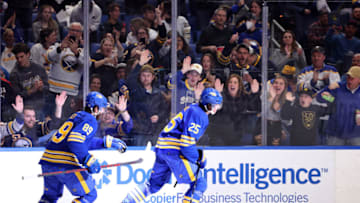 Apr 14, 2022; Buffalo, New York, USA; Buffalo Sabres defenseman Owen Power (25) reacts after getting an assist on for his first career NHL point on a goal scored by right wing Alex Tuch (89) during the second period against the St. Louis Blues at KeyBank Center. Mandatory Credit: Timothy T. Ludwig-USA TODAY Sports