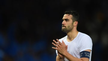 LEICESTER, ENGLAND - MARCH 14: A dejected Vicente Iborra of Sevilla walks off the pitch following his team's 3-2 agg defeat during the UEFA Champions League Round of 16, second leg match between Leicester City and Sevilla FC at The King Power Stadium on March 14, 2017 in Leicester, United Kingdom. (Photo by Laurence Griffiths/Getty Images)
