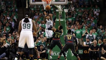 Apr 22, 2016; Boston, MA, USA; Boston Celtics guard Isaiah Thomas (4) passes the ball against Atlanta Hawks forward Kent Bazemore (24) during the third quarter in game three of the first round of the NBA Playoffs at TD Garden. Mandatory Credit: David Butler II-USA TODAY Sports