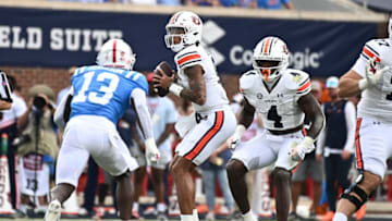 Auburn footballOct 15, 2022; Oxford, Mississippi, USA; Auburn Tigers quarterback Robby Ashford (9) looks to pass against the Mississippi Rebels during the first quarter at Vaught-Hemingway Stadium. Mandatory Credit: Matt Bush-USA TODAY Sports