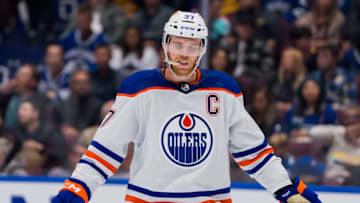 Oct 11, 2023; Vancouver, British Columbia, CAN; Edmonton Oilers forward Connor McDavid (97) reacts to the a goal being scored against the Vancouver Canucks in the second period at Rogers Arena. Mandatory Credit: Bob Frid-USA TODAY Sports