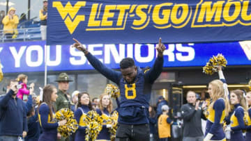 Nov 28, 2015; Morgantown, WV, USA; West Virginia Mountaineers safety Karl Joseph (8) is honored on senior day before their game against the Iowa State Cyclones at Milan Puskar Stadium. Mandatory Credit: Ben Queen-USA TODAY Sports