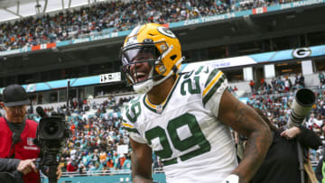 Dec 25, 2022; Miami Gardens, Florida, USA; Green Bay Packers cornerback Rasul Douglas (29) celebrates after intercepting the football during the fourth quarter against the Miami Dolphins at Hard Rock Stadium. Mandatory Credit: Sam Navarro-USA TODAY Sports