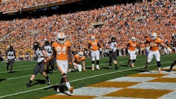 Nov 10, 2012; Knoxville, TN, USA; Tennessee Volunteers wide receiver Cordarrelle Patterson (84) scores a touchdown against the Missouri Tigers during the first half at Neyland Stadium. Mandatory Credit: Jim Brown-USA TODAY Sports