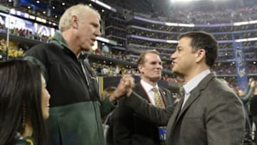 Jan 12, 2015; Arlington, TX, USA; NBA former player Bill Walton talks with television host Jimmy Kimmel before the game between the Ohio State Buckeyes and the Oregon Ducks in the 2015 CFP National Championship Game at AT&T Stadium. Mandatory Credit: Tommy Gilligan-USA TODAY Sports