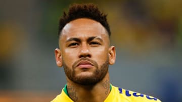 BRASILIA, BRAZIL - JUNE 05: Neymar Jr. of Brazil looks on during the national anthem before the friendly match against Qatar at Mane Garrincha Stadium on June 05, 2019 in Brasilia, Brazil. (Photo by Alexandre Schneider/Getty Images)