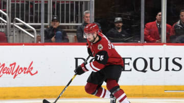 GLENDALE, AZ - FEBRUARY 07: Kyle Capobianco #75 of the Arizona Coyotes skates the puck up ice against the Columbus Blue Jackets at Gila River Arena on February 7, 2019 in Glendale, Arizona. (Photo by Norm Hall/NHLI via Getty Images)