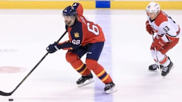 Apr 9, 2016; Sunrise, FL, USA; Florida Panthers right wing Jaromir Jagr (68) skates with the puck past Carolina Hurricanes left wing Jeff Skinner (53) in the third period at BB&T Center. The Panthers won 5-2. Mandatory Credit: Robert Mayer-USA TODAY Sports