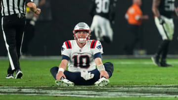 LAS VEGAS, NEVADA - DECEMBER 18: Mac Jones #10 of the New England Patriots reacts after losing to the Las Vegas Raiders at Allegiant Stadium on December 18, 2022 in Las Vegas, Nevada. (Photo by Chris Unger/Getty Images)