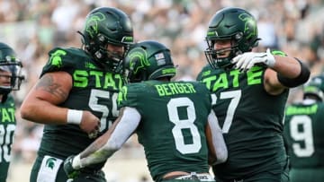 Michigan State's Jalen Berger, center, celebrates his touchdown with Nick Samac, left, and J.D. Duplain during the third quarter in the game against Akron on Saturday, Sept. 10, 2022, at Spartan Stadium in East Lansing.220910 Msu Akron Fb 215a