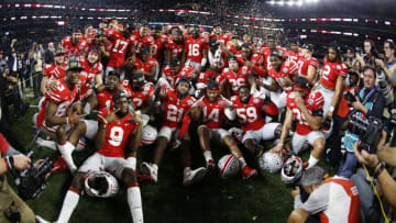 ARLINGTON, TX - DECEMBER 29: The Ohio State Buckeyes celebrate with a team photo following the 82nd Goodyear Cotton Bowl Classic between USC and Ohio State at AT
