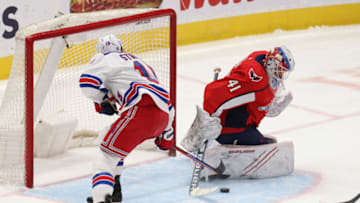 Mar 19, 2021; Washington, District of Columbia, USA; Washington Capitals goaltender Vitek Vanecek (41) makes a save on New York Rangers center Ryan Strome (16) in the second period at Capital One Arena. Mandatory Credit: Geoff Burke-USA TODAY Sports