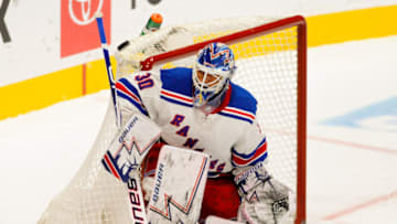 SAN JOSE, CA - OCTOBER 30: A puck flies towards New York Rangers goaltender Henrik Lundqvist (30) in the first period during the game between the New York Rangers and the San Jose Sharks on October 30, 2018, at SAP Center in San Jose, CA. (Photo by Samuel Stringer/Icon Sportswire via Getty Images)