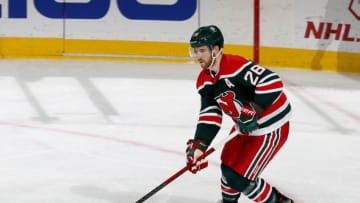 Damon Severson #28 of the New Jersey Devils. (Photo by Elsa/Getty Images)