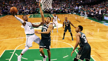 BOSTON, MA - APRIL 28: Marcus Smart #36 of the Boston Celtics takes a shot against Malcolm Brogdon #13 of the Milwaukee Bucks in Game Seven of Round One of the 2018 NBA Playoffs at TD Garden on April 28, 2018 in Boston, Massachusetts. The Celtics defeat the Bucks 112-96. (Photo by Maddie Meyer/Getty Images)
