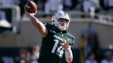 EAST LANSING, MI - SEPTEMBER 30: Quarterback Brian Lewerke #14 of the Michigan State Spartans passes the ball against the Iowa Hawkeyes during the first half at Spartan Stadium on September 30, 2017 in East Lansing, Michigan. (Photo by Duane Burleson/Getty Images)