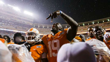 KNOXVILLE, TENNESSEE - NOVEMBER 30: Darrell Taylor #19 of the Tennessee Volunteers celebrates defeating the Vanderbilt Commodores during their senior night game at Neyland Stadium on November 30, 2019 in Knoxville, Tennessee. (Photo by Silas Walker/Getty Images)