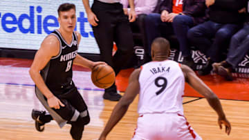 Bogdan Bogdanovic #8 of the Sacramento Kings against Serge Ibaka #9 of the Toronto Raptors during the Toronto Raptors vs Sacramento Kings NBA regular season game at Scotiabank Arena on January 22, 2018 in Toronto, Canada (Toronto Raptors win 120-105) (Photo by Anatoliy Cherkasov/NurPhoto via Getty Images)