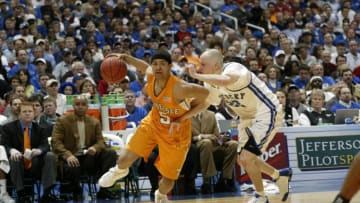 ATLANTA, GA - MARCH 11: Chris Lofton #5 of the Tennessee Volunteers handles the ball against Patrick Sparks #22 of the Kentucky Wildcats during the SEC Tournament at the Georgia Dome on March 11, 2005 in Atlanta, Georgia. Kentucky won 76-62. (Photo by Joe Robbins/Getty Images)