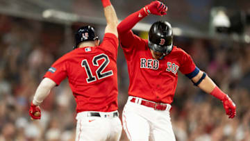 BOSTON, MA - JUNE 1: Kiké Hernandez #5 of the Boston Red Sox reacts with Connor Wong #12 of the Boston Red Sox after hitting a home run during the eighth inning of a game against the Cincinnati Reds on June 1, 2023 at Fenway Park in Boston, Massachusetts. (Photo by Maddie Malhotra/Boston Red Sox/Getty Images)