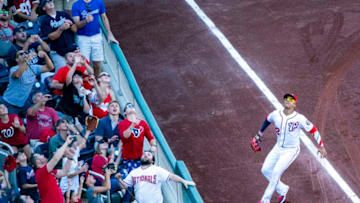 WASHINGTON, DC - SEPTEMBER 15: Fans and Washington Nationals left fielder Juan Soto (22) await the ball during a MLB game between the Washington Nationals and the Atlanta Braves, on September 15, 2019, at Nationals Park, in Washington, D.C.(Photo by Tony Quinn/Icon Sportswire via Getty Images)